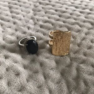 black stone ring and gold ring